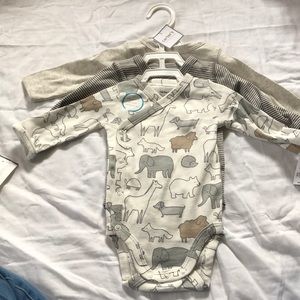 Neutral long sleeved body suits